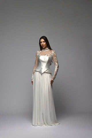 Minimalist romantic A-line wedding dress with a clean floor-length skirt
