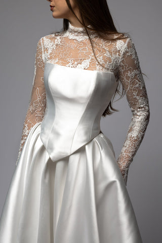 Minimalist Mikado ball gown wedding dress with a full sculpted skirt